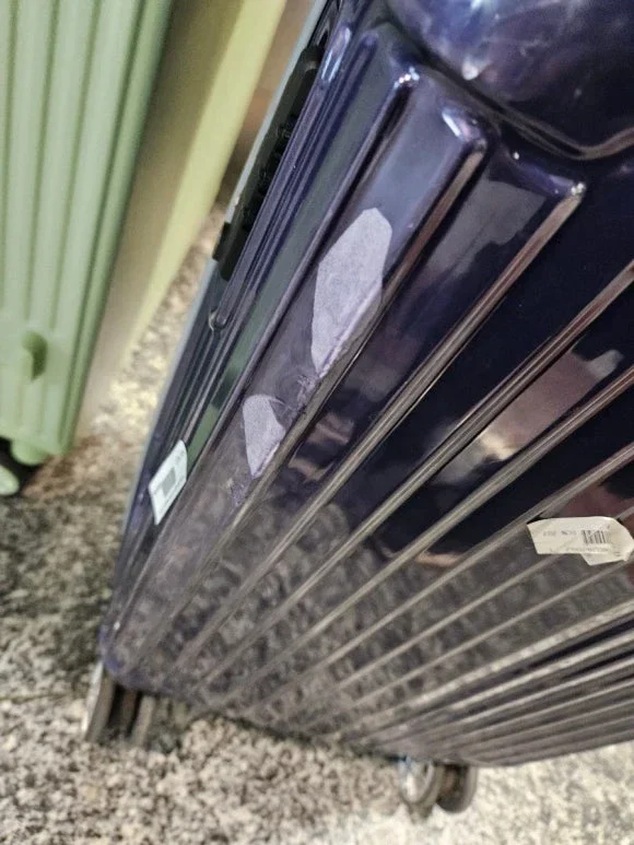 Damaged Suitcase